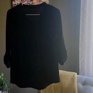 Three-quarter sleeve tunic.